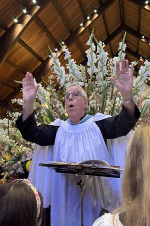 Andrew Walker conducting a church group